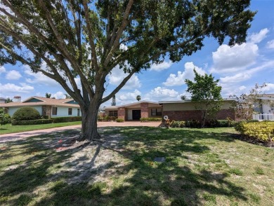 Under contract-accepting backup offers. Mid-century modern block on Rocky Point Golf Course in Florida - for sale on GolfHomes.com, golf home, golf lot