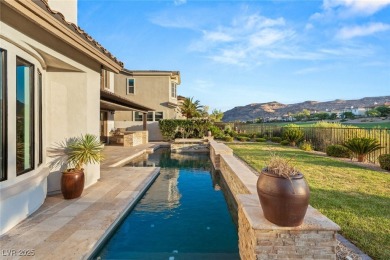 Perched on an elevated lot with panoramic golf and Red Rock on Red Rock Country Club in Nevada - for sale on GolfHomes.com, golf home, golf lot