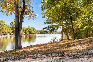 Car enthusiasts will love the detached, heated and cooled garage on River Golf and Country Club at Lake Royale in North Carolina - for sale on GolfHomes.com, golf home, golf lot