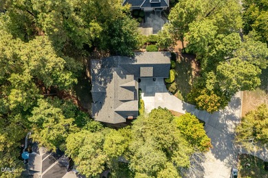 At the end of a quiet, wooded cul-de-sac in gated Governors on Governors Club in North Carolina - for sale on GolfHomes.com, golf home, golf lot
