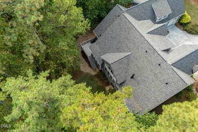 At the end of a quiet, wooded cul-de-sac in gated Governors on Governors Club in North Carolina - for sale on GolfHomes.com, golf home, golf lot