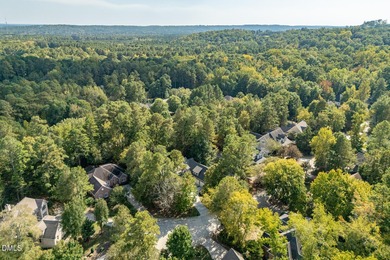 At the end of a quiet, wooded cul-de-sac in gated Governors on Governors Club in North Carolina - for sale on GolfHomes.com, golf home, golf lot