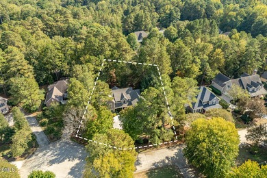 At the end of a quiet, wooded cul-de-sac in gated Governors on Governors Club in North Carolina - for sale on GolfHomes.com, golf home, golf lot