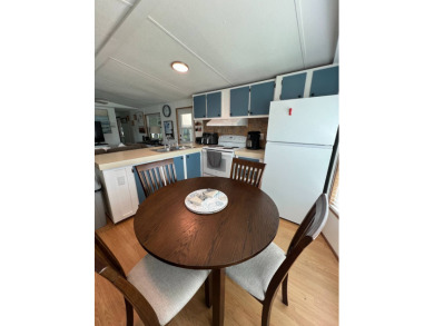 This well maintained and beautifully furnished home, in active on Lake Henry Golf Club in Florida - for sale on GolfHomes.com, golf home, golf lot