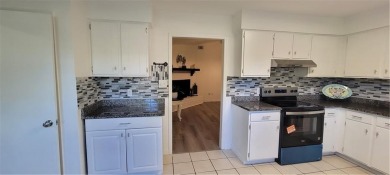 If you are looking for a 4-bedroom house with a large parking on Lake Forest Yacht and Country Club in Alabama - for sale on GolfHomes.com, golf home, golf lot
