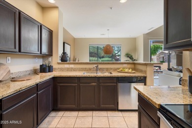 Elegant lock-and-leave on a premier corner lot in Cachet at on Talon at Grayhawk Golf Course in Arizona - for sale on GolfHomes.com, golf home, golf lot