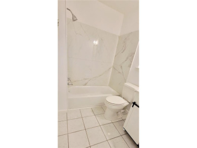 If you are looking for a 4-bedroom house with a large parking on Lake Forest Yacht and Country Club in Alabama - for sale on GolfHomes.com, golf home, golf lot