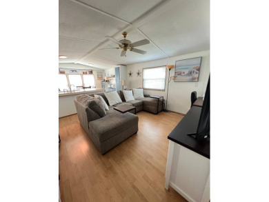 This well maintained and beautifully furnished home, in active on Lake Henry Golf Club in Florida - for sale on GolfHomes.com, golf home, golf lot