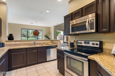 Elegant lock-and-leave on a premier corner lot in Cachet at on Talon at Grayhawk Golf Course in Arizona - for sale on GolfHomes.com, golf home, golf lot