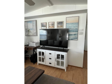 This well maintained and beautifully furnished home, in active on Lake Henry Golf Club in Florida - for sale on GolfHomes.com, golf home, golf lot