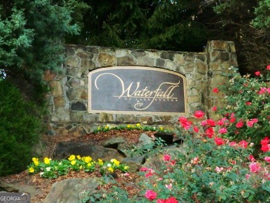 Tucked away on a quiet, no-outlet street with minimal traffic on Waterfall Country Club in Georgia - for sale on GolfHomes.com, golf home, golf lot