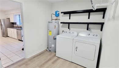 If you are looking for a 4-bedroom house with a large parking on Lake Forest Yacht and Country Club in Alabama - for sale on GolfHomes.com, golf home, golf lot