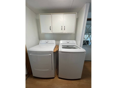 This well maintained and beautifully furnished home, in active on Lake Henry Golf Club in Florida - for sale on GolfHomes.com, golf home, golf lot
