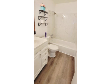 If you are looking for a 4-bedroom house with a large parking on Lake Forest Yacht and Country Club in Alabama - for sale on GolfHomes.com, golf home, golf lot