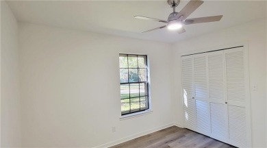 If you are looking for a 4-bedroom house with a large parking on Lake Forest Yacht and Country Club in Alabama - for sale on GolfHomes.com, golf home, golf lot