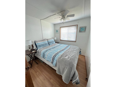 This well maintained and beautifully furnished home, in active on Lake Henry Golf Club in Florida - for sale on GolfHomes.com, golf home, golf lot