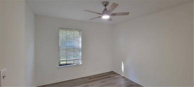If you are looking for a 4-bedroom house with a large parking on Lake Forest Yacht and Country Club in Alabama - for sale on GolfHomes.com, golf home, golf lot
