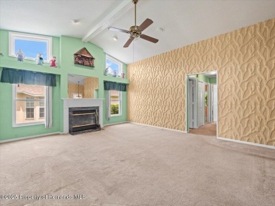 Spacious 3/2/2 well-maintained pool home with split floor plan on Seven Hills Golfers Club in Florida - for sale on GolfHomes.com, golf home, golf lot