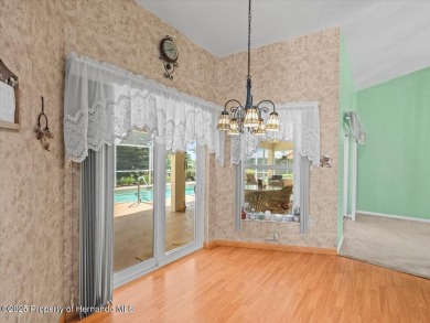 Spacious 3/2/2 well-maintained pool home with split floor plan on Seven Hills Golfers Club in Florida - for sale on GolfHomes.com, golf home, golf lot