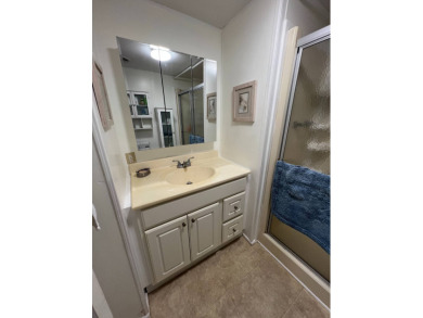 This well maintained and beautifully furnished home, in active on Lake Henry Golf Club in Florida - for sale on GolfHomes.com, golf home, golf lot