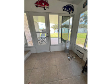 This well maintained and beautifully furnished home, in active on Lake Henry Golf Club in Florida - for sale on GolfHomes.com, golf home, golf lot
