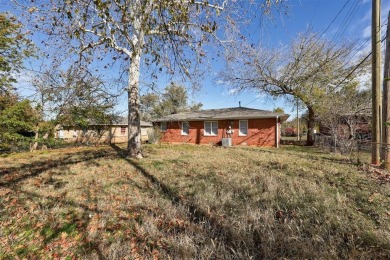 Welcome to this beautifully maintained 3-bedroom, 1-bathroom on John Conrad Golf Course in Oklahoma - for sale on GolfHomes.com, golf home, golf lot