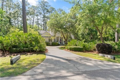 Tucked behind a canopy of mature trees, this beautifully on Oak Grove Island Golf and Country Club in Georgia - for sale on GolfHomes.com, golf home, golf lot
