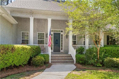 Tucked behind a canopy of mature trees, this beautifully on Oak Grove Island Golf and Country Club in Georgia - for sale on GolfHomes.com, golf home, golf lot
