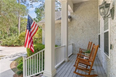 Tucked behind a canopy of mature trees, this beautifully on Oak Grove Island Golf and Country Club in Georgia - for sale on GolfHomes.com, golf home, golf lot