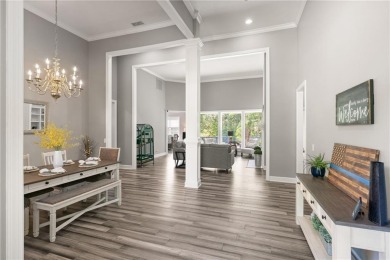 Tucked behind a canopy of mature trees, this beautifully on Oak Grove Island Golf and Country Club in Georgia - for sale on GolfHomes.com, golf home, golf lot