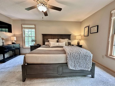 Step into this immaculate custom home, perfectly situated with on Michaywe Pines Course in Michigan - for sale on GolfHomes.com, golf home, golf lot