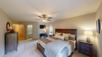 Step into this immaculate custom home, perfectly situated with on Michaywe Pines Course in Michigan - for sale on GolfHomes.com, golf home, golf lot