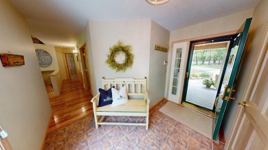 Step into this immaculate custom home, perfectly situated with on Michaywe Pines Course in Michigan - for sale on GolfHomes.com, golf home, golf lot