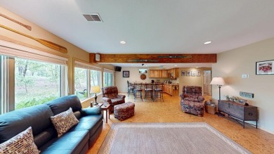 Step into this immaculate custom home, perfectly situated with on Michaywe Pines Course in Michigan - for sale on GolfHomes.com, golf home, golf lot