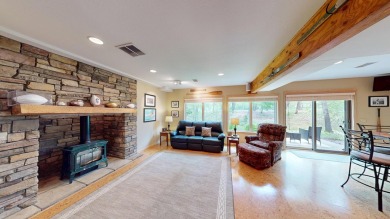 Step into this immaculate custom home, perfectly situated with on Michaywe Pines Course in Michigan - for sale on GolfHomes.com, golf home, golf lot