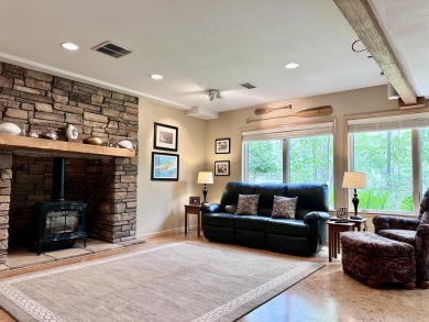 Step into this immaculate custom home, perfectly situated with on Michaywe Pines Course in Michigan - for sale on GolfHomes.com, golf home, golf lot