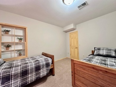 Step into this immaculate custom home, perfectly situated with on Michaywe Pines Course in Michigan - for sale on GolfHomes.com, golf home, golf lot
