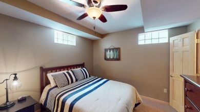 Step into this immaculate custom home, perfectly situated with on Michaywe Pines Course in Michigan - for sale on GolfHomes.com, golf home, golf lot