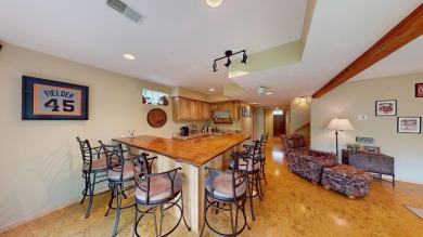 Step into this immaculate custom home, perfectly situated with on Michaywe Pines Course in Michigan - for sale on GolfHomes.com, golf home, golf lot