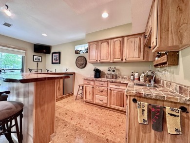 Step into this immaculate custom home, perfectly situated with on Michaywe Pines Course in Michigan - for sale on GolfHomes.com, golf home, golf lot