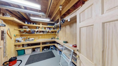 Step into this immaculate custom home, perfectly situated with on Michaywe Pines Course in Michigan - for sale on GolfHomes.com, golf home, golf lot