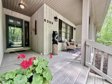 Step into this immaculate custom home, perfectly situated with on Michaywe Pines Course in Michigan - for sale on GolfHomes.com, golf home, golf lot