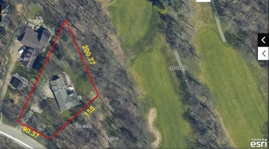 Step into this immaculate custom home, perfectly situated with on Michaywe Pines Course in Michigan - for sale on GolfHomes.com, golf home, golf lot
