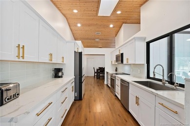 The Ultimate in Living Enjoyment! Set on 3.47 acres in the on The Cape Club of Palm City in Florida - for sale on GolfHomes.com, golf home, golf lot