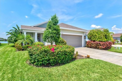 Lakeside luxury on the largest lake in Canoe Creek defines this on Palmetto Pines Golf Course in Florida - for sale on GolfHomes.com, golf home, golf lot