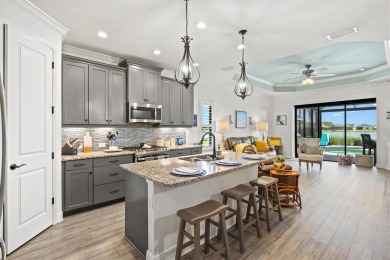 Lakeside luxury on the largest lake in Canoe Creek defines this on Palmetto Pines Golf Course in Florida - for sale on GolfHomes.com, golf home, golf lot