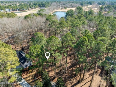 Discover the perfect setting to build your custom dream home in on River Landing Golf Course in North Carolina - for sale on GolfHomes.com, golf home, golf lot