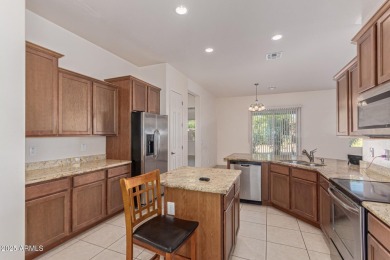 Live the Estrella Mountain Ranch lifestyle in this beautifully on Estrella Mountain Ranch Golf Course in Arizona - for sale on GolfHomes.com, golf home, golf lot