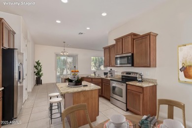 Live the Estrella Mountain Ranch lifestyle in this beautifully on Estrella Mountain Ranch Golf Course in Arizona - for sale on GolfHomes.com, golf home, golf lot