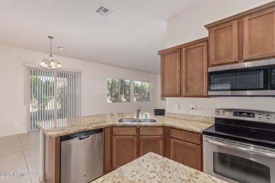 Live the Estrella Mountain Ranch lifestyle in this beautifully on Estrella Mountain Ranch Golf Course in Arizona - for sale on GolfHomes.com, golf home, golf lot